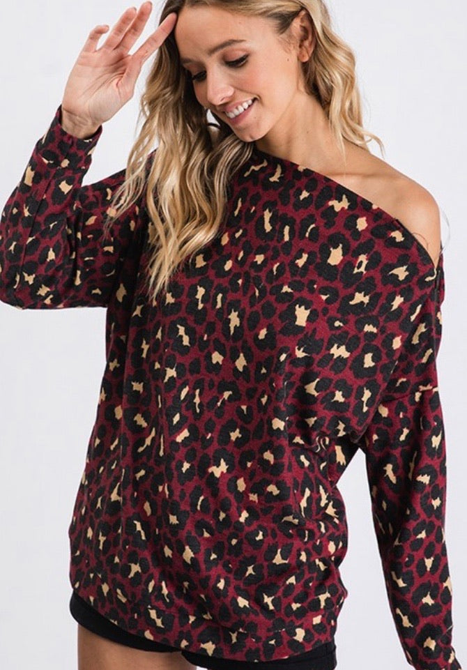 Animal print long sleeve top with side zipper detail
